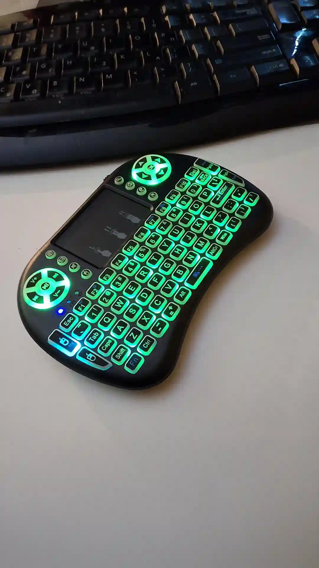 gamepad-styled rgb wireless mini keyboard with touchpad and extra controls and buttons with lit keyboard with many colors