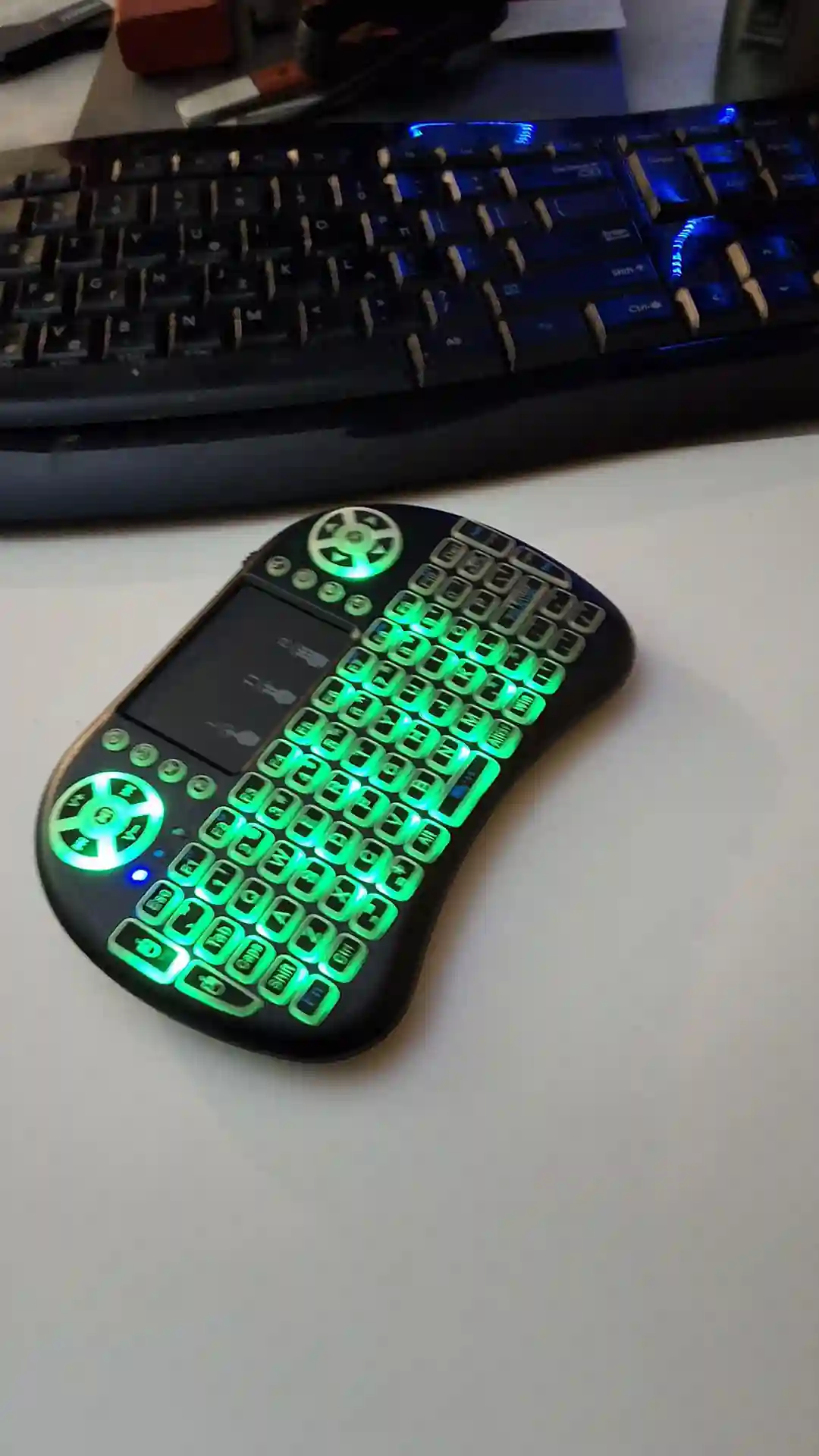 gamepad-styled rgb wireless mini keyboard with touchpad and extra controls and buttons with lit keyboard with many colors
