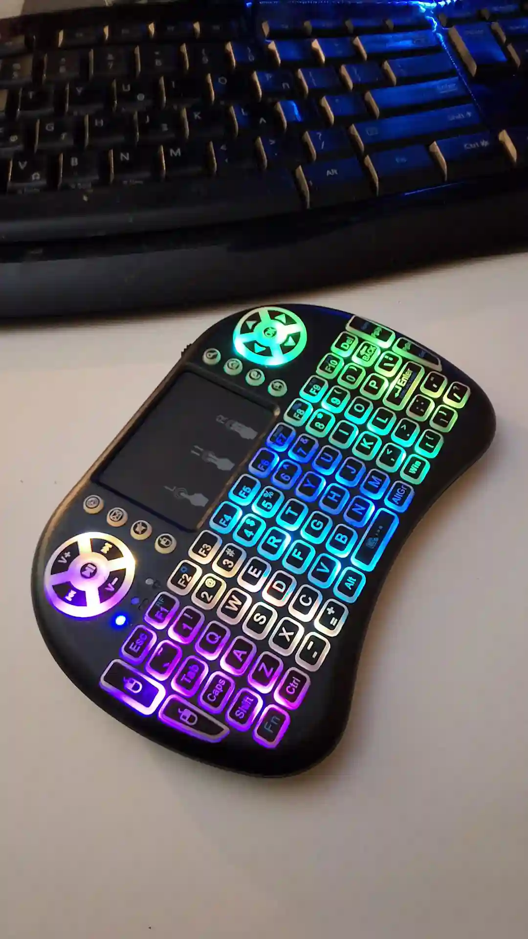 gamepad-styled rgb wireless mini keyboard with touchpad and extra controls and buttons with lit keyboard with many colors