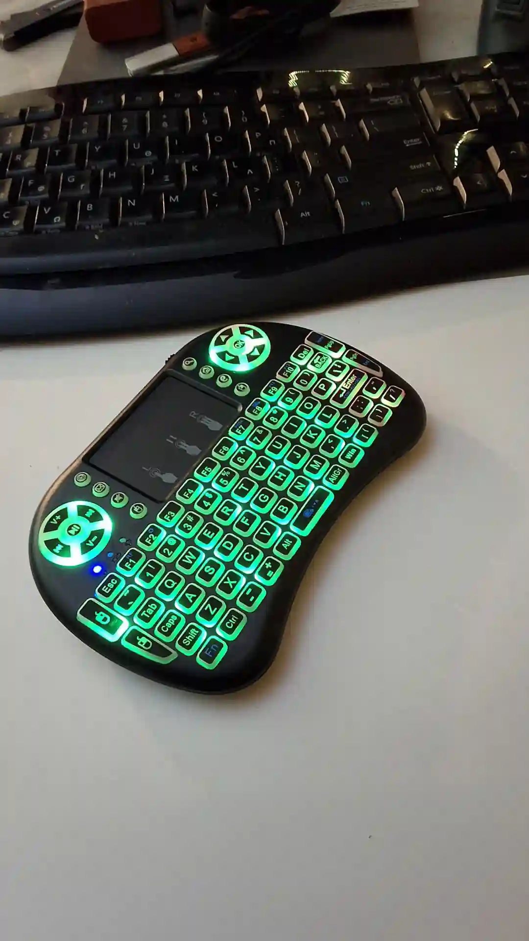 gamepad-styled rgb wireless mini keyboard with touchpad and extra controls and buttons with lit keyboard with many colors