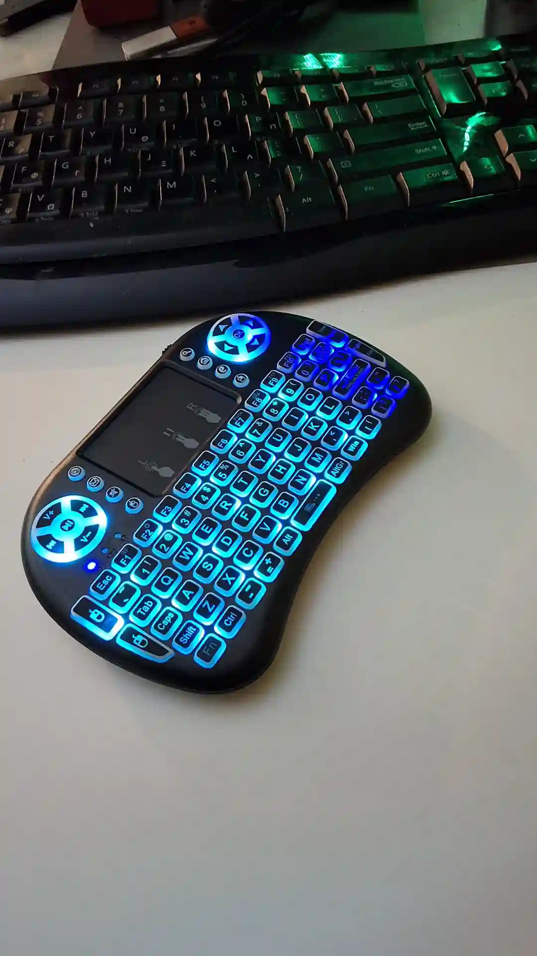 gamepad-styled rgb wireless mini keyboard with touchpad and extra controls and buttons with lit keyboard with many colors