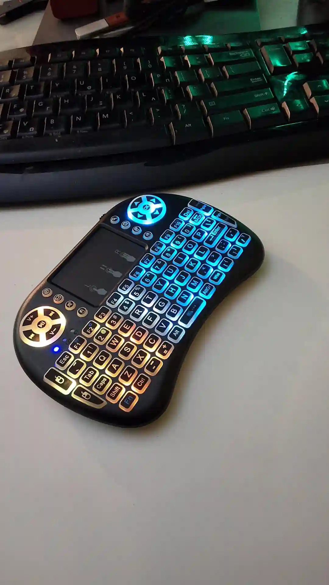 gamepad-styled rgb wireless mini keyboard with touchpad and extra controls and buttons with lit keyboard with many colors