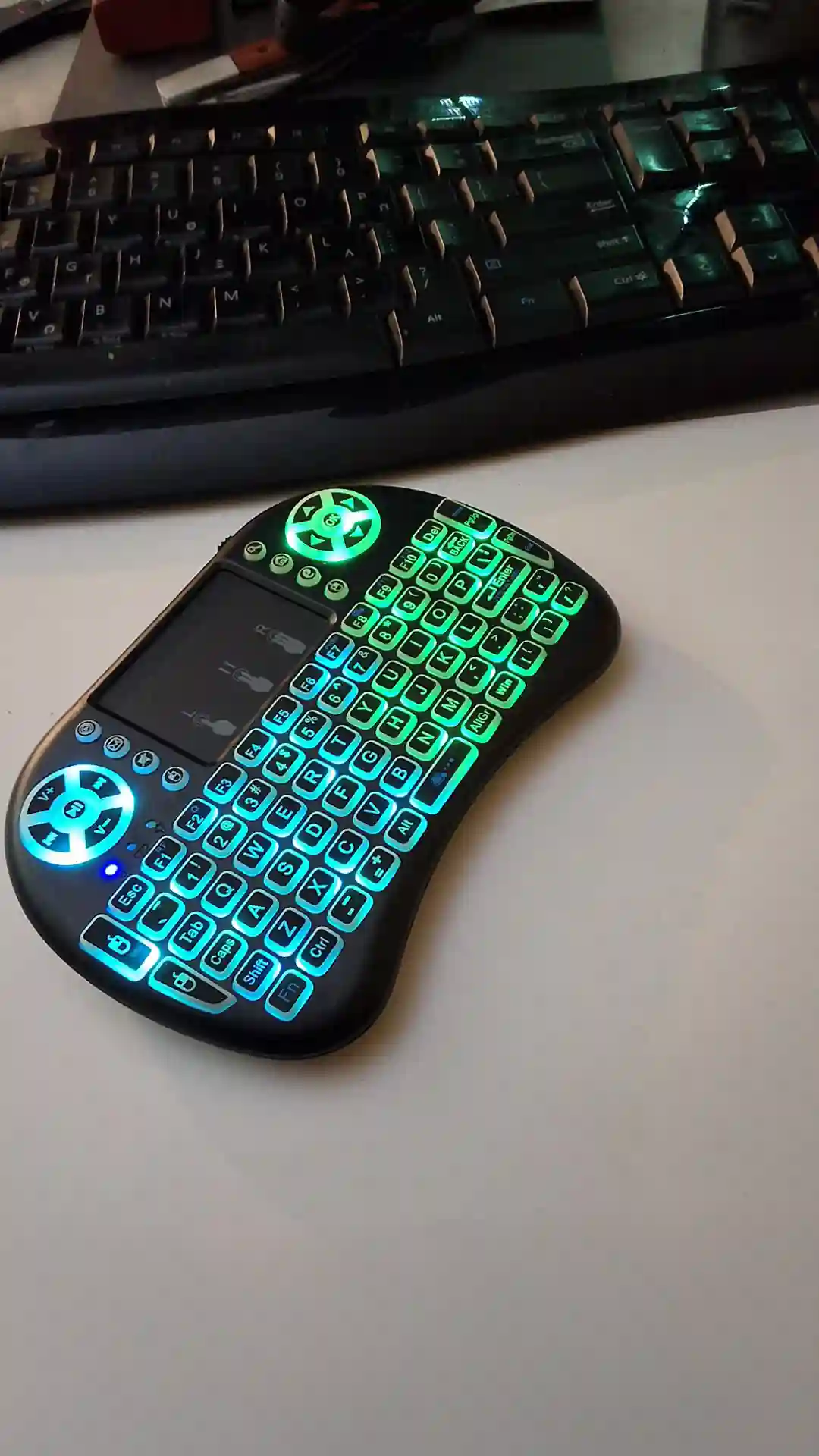 gamepad-styled rgb wireless mini keyboard with touchpad and extra controls and buttons with lit keyboard with many colors