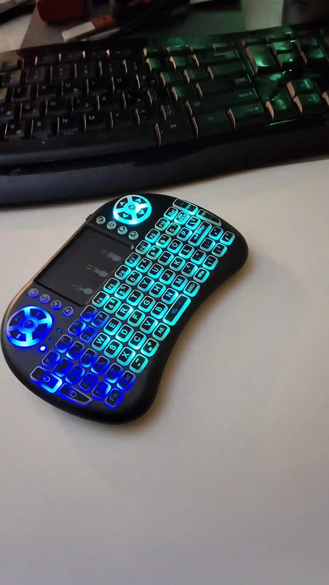 gamepad-styled rgb wireless mini keyboard with touchpad and extra controls and buttons with lit keyboard with many colors