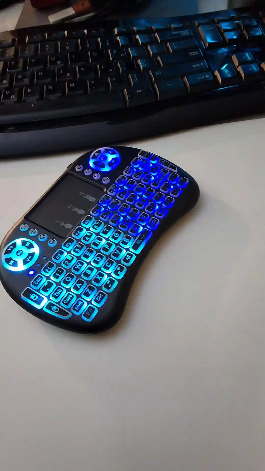 gamepad-styled rgb wireless mini keyboard with touchpad and extra controls and buttons with lit keyboard with many colors